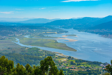 Wall Mural - Aerial view of Minho river making a border between Spain and Portugal