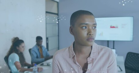 Canvas Print - Animation of digital icons floating over african american woman smiling at office