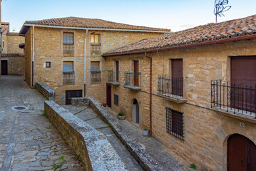 Wall Mural - Sunrise view of a Medieval street in Spanish village Sos del Rey Catolico