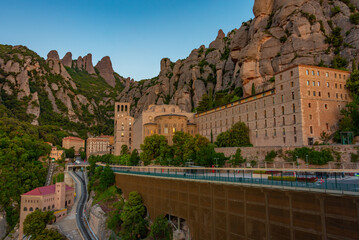 Wall Mural - Sunrise over Santa Maria de Montserrat abbey in Spain