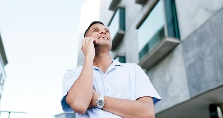 Poster - Phone call, happy and casual man in a city, relax and smile while enjoying day off outdoors against building background. Smartphone, conversation and young indian guy walking, free and calm in London