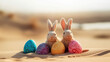 Cute rabbit toys and painted easter eggs. Shallow depth of field. Concept of happy easter day.