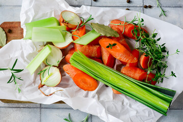 Sticker - Fresh vegetables and herbs for broth on the table