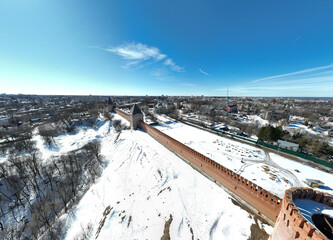 Wall Mural - panoramic view from a drone of the historical part of Smolensk with a fortress wall and churches on a sunny winter day