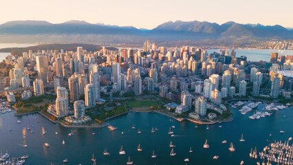 Wall Mural - Vancouver downtown skyline aerial crane up shot, BC, Canada at sunset