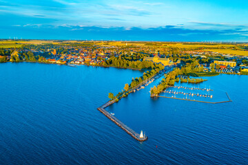 Wall Mural - Sunset aerial view of Swedish town Vadstena and its castle