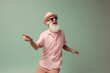 © aledesun - happy old hipster bearded man posing on camera,  happy mood generative ai illustration