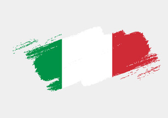 Artistic grunge brush flag of Italy isolated on white background. Elegant texture of national country flag