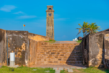 Sticker - Galle fort clock tower looking over military bastions, Sri Lanka