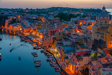 Wall Mural - Sunset view of Marina di Corricella at Italian island Procida