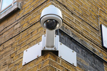 Outdoor CCTV Camera On Wall Of Street Corner