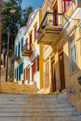 Wall Mural - Colorful streets of a town at Greek island Symi