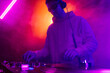© fotofabrika - Male DJ playing music in the night club