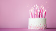 Leinwandbild Motiv Pink birthday cake with many pink birthday candles and sparklers