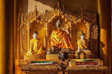 buddha statues in burma famous sacred place and tourist attraction landmark - shwedagon paya pagoda.