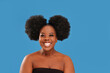© neonshot - Real positive emotions. Happy, authentic afro woman laughing and looking at camera