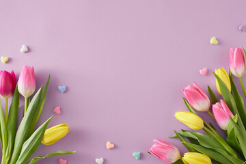 mother's day atmosphere idea. top view composition of bouquets of pink yellow tulips flowers and col