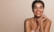 Women beauty and health. Young smiling african american girl, laughing and smiling, posing with glowing, clean and clear skin without blemishes, healthy facial glow after moisturizer, nourishing gel