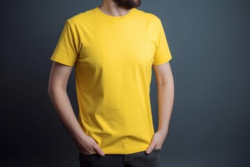 Wall Mural - Male model wearing yellow t-shirt