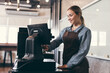 Cafe beautiful caucasian waitress cashes in order bill register working happy at coffee shop