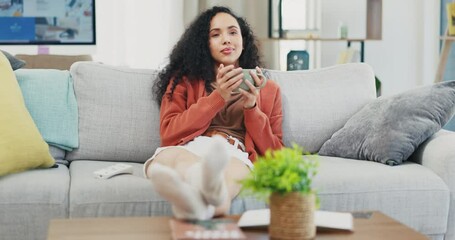 Canvas Print - Woman relax on couch, coffee and watching tv, happy and content, drink and entertainment with remote control. Female at home with smile, hot beverage and break, chilling and online streaming service