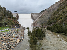 A View Of Water Cascading Over The Spillway Of The Cotter Dam Wall In The ACT, Australia.