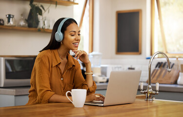 Wall Mural - Video call, remote work and woman in kitchen on laptop for virtual meeting, strategy and planning at home. Freelancer, business and girl with headphones for seminar, working online and conversation