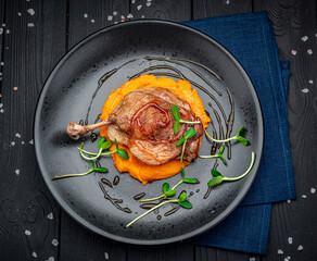 Wall Mural - Grilled chicken leg with pumpkin puree.