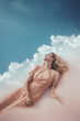 © ADDICTIVE STOCK - Tender lying on heaven clouds. Generative AI