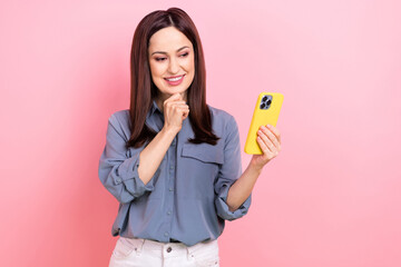 Sticker - Photo of smart intelligent minded adorable lady hand chin face wear stylish grey clothes use iphone isolated on pink color background