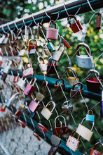 Love Locks Hanging On Fence