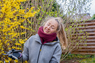 Happy woman in a garden.