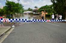 Police Line Keeping Residents Away From Rising Flood Waters
