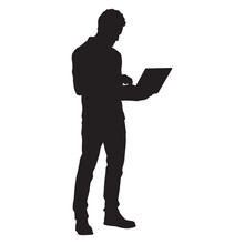 Businessman Standing And Working On Laptop Silhouette.