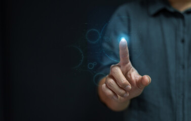  business man hand pointing at abstract glowing polygonal sphere and digital business interface on blurry blue background. Future, innovation and technology concept.