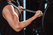 © Kiattisak - Male working out Bodybuilder with barbell weights at the gym.man bodybuilder doing exercises with barbell. training sport healthy lifestyle bodybuilding, Athlete builder muscles lifestyle...