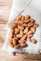 Wall Mural - pile of natural almonds (Prunus dulcis) close-up image