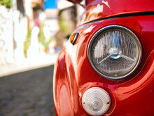 Headlights Of A Red Retro Car Close-up