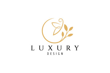 luxury gold logo butterfly perching on leaf or flower in simple flat design style