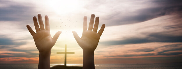 Wall Mural - child raising hands - concept of hope and asking god for help