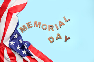 Text MEMORIAL DAY with USA flag on blue background