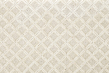 Waffle biscuit close-up background mesh surface, background wallpaper, uniform texture pattern