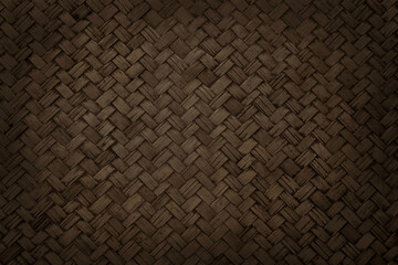 Old brown bamboo weave texture background, pattern of woven rattan mat in vintage style.