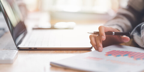 Aufkleber - Businessman reading graph report and business statistics charts ,Analysis and improvement of corporate strategy ,manage financial and marketing documents , Statistics and Data Concepts