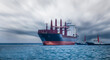 large carrier ship floating in sea, tugboat dragging container ship, stromy sky background motion blur sea in front, mode of transportation concept,
