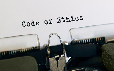 Poster - text code of ethics typed on retro typewriter
