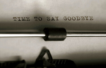 Poster - text time to say goodbye typed on retro typewriter
