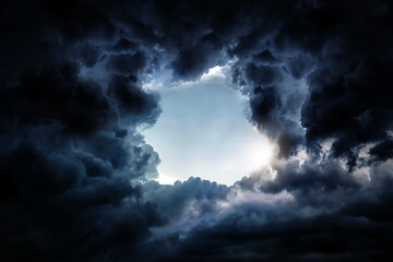Wall Mural - hole in the dramatic clouds