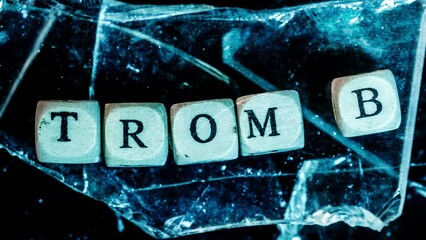 Poster - cubes standing on the glass with the inscription thrombus