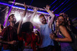 © bernardbodo - Young friends enjoying a performance at a festival together